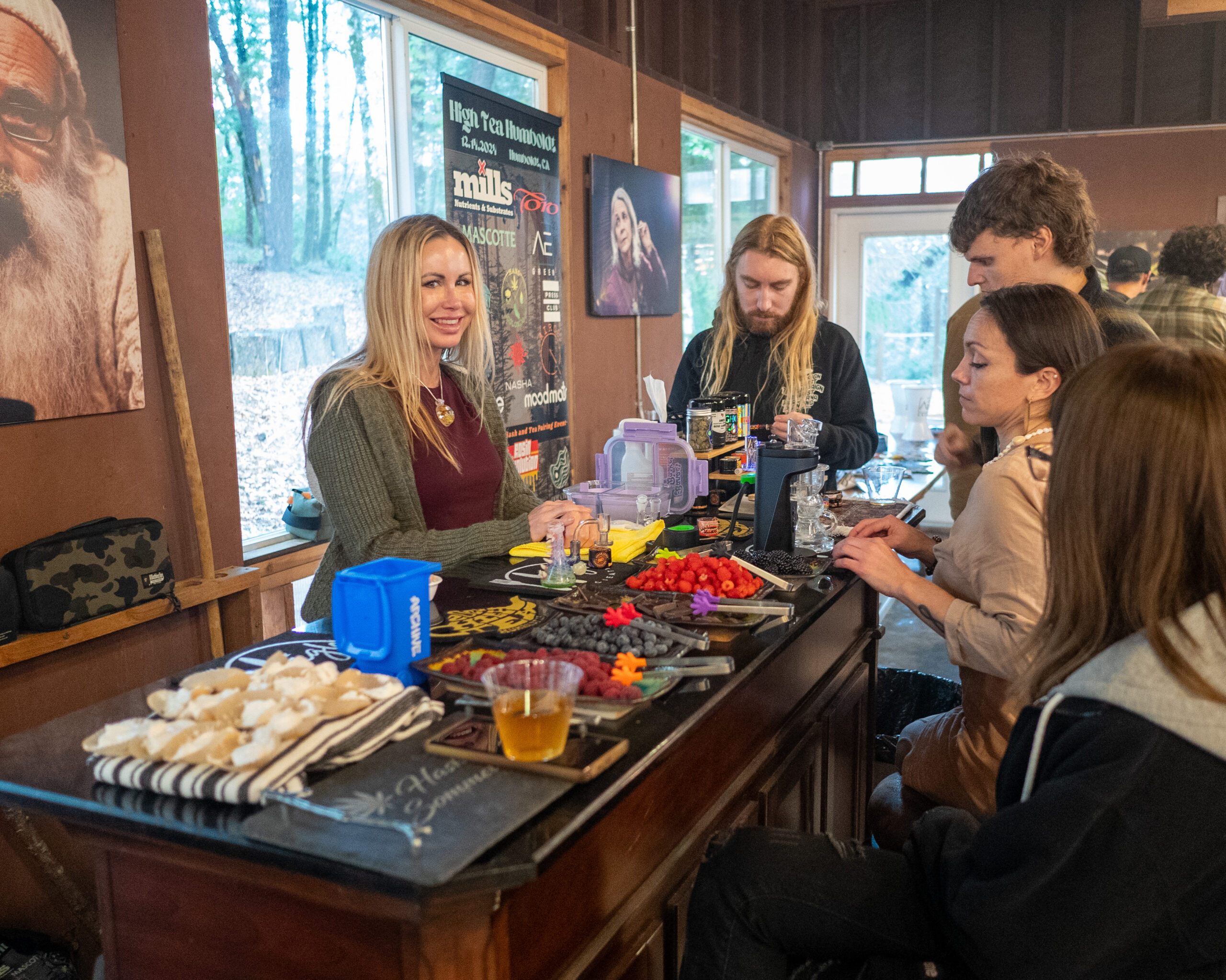 Guests gathered around the bar at a High Tea Humboldt cannabis and culinary tasting event inside the Dojo at Farmer and Flame retreat in Southern Humboldt County