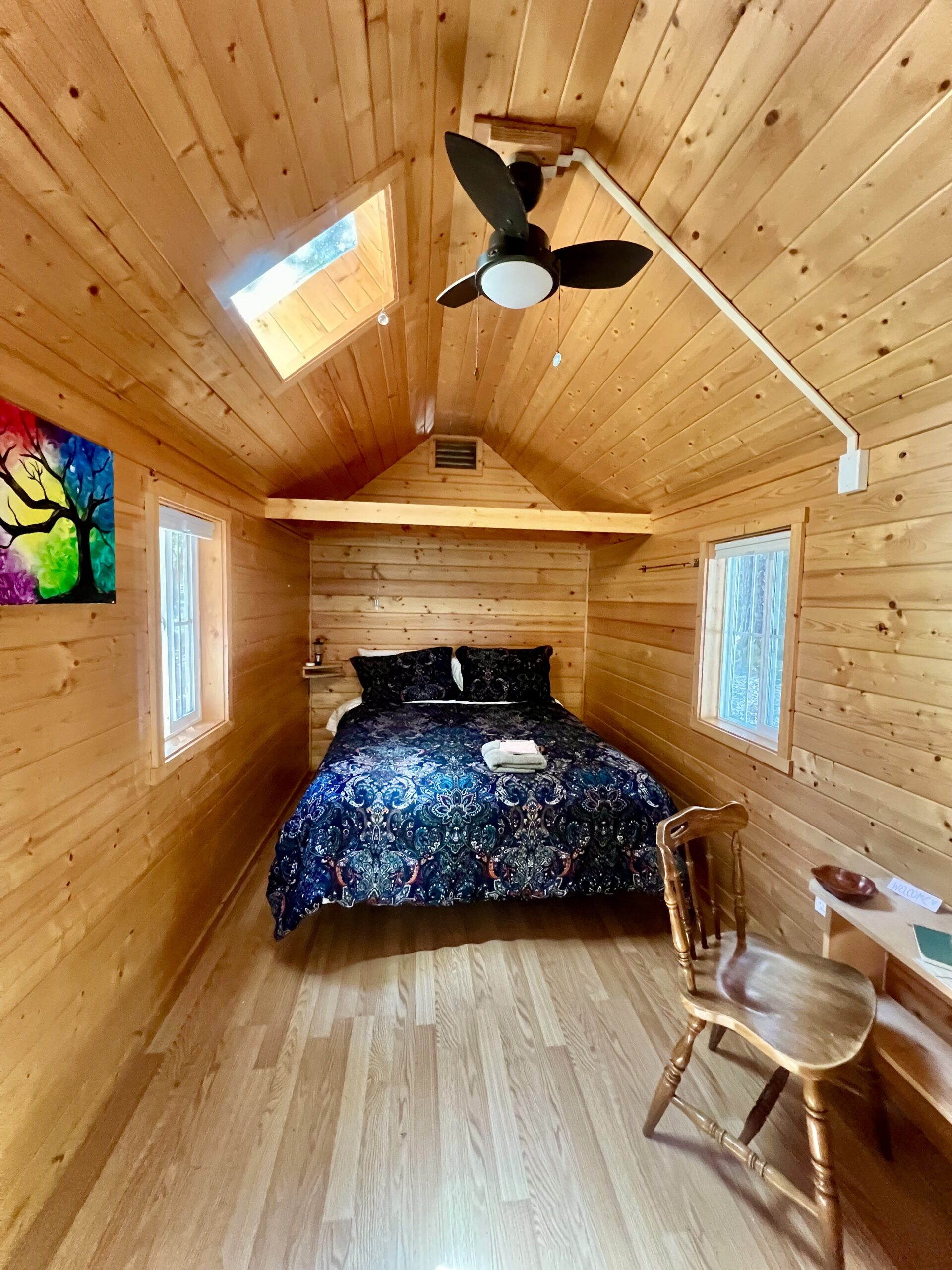 Cozy cabin interior with rustic furnishings at Farmer and Flame retreat accommodations
